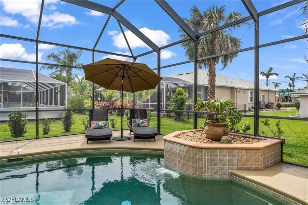 a view of a swimming pool with a patio