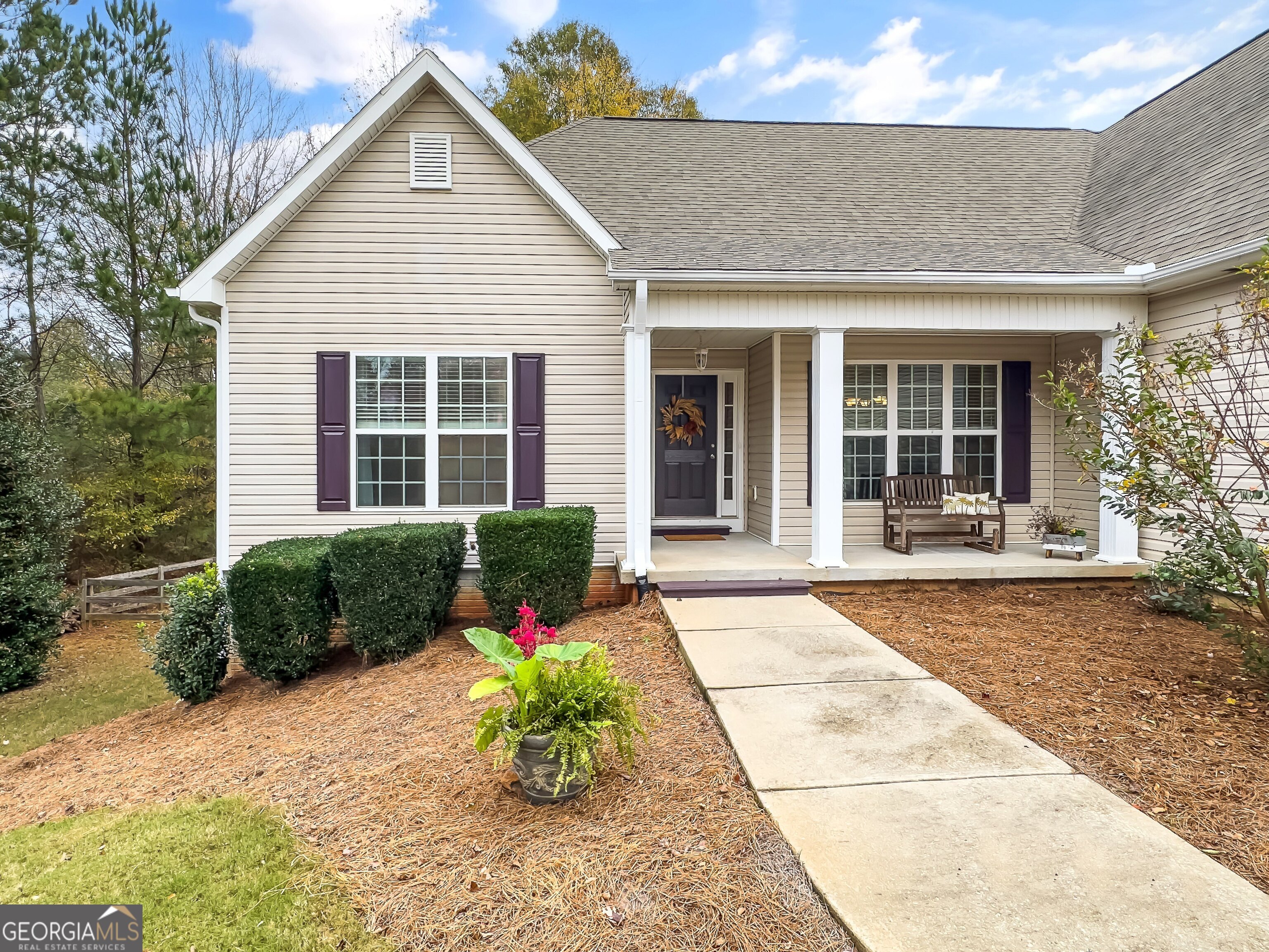 a front view of a house with a porch