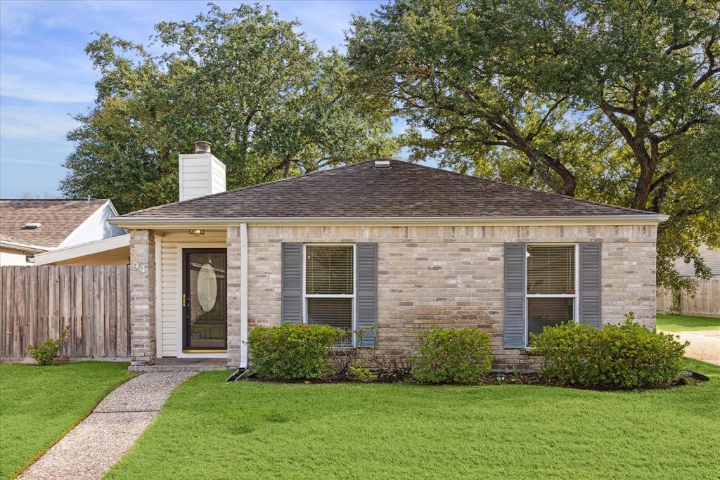 Classic and modern one-story ranch-style home with clean lines and a brick/plank exterior, perfectly positioned on a corner lot on private cul-de-sac.