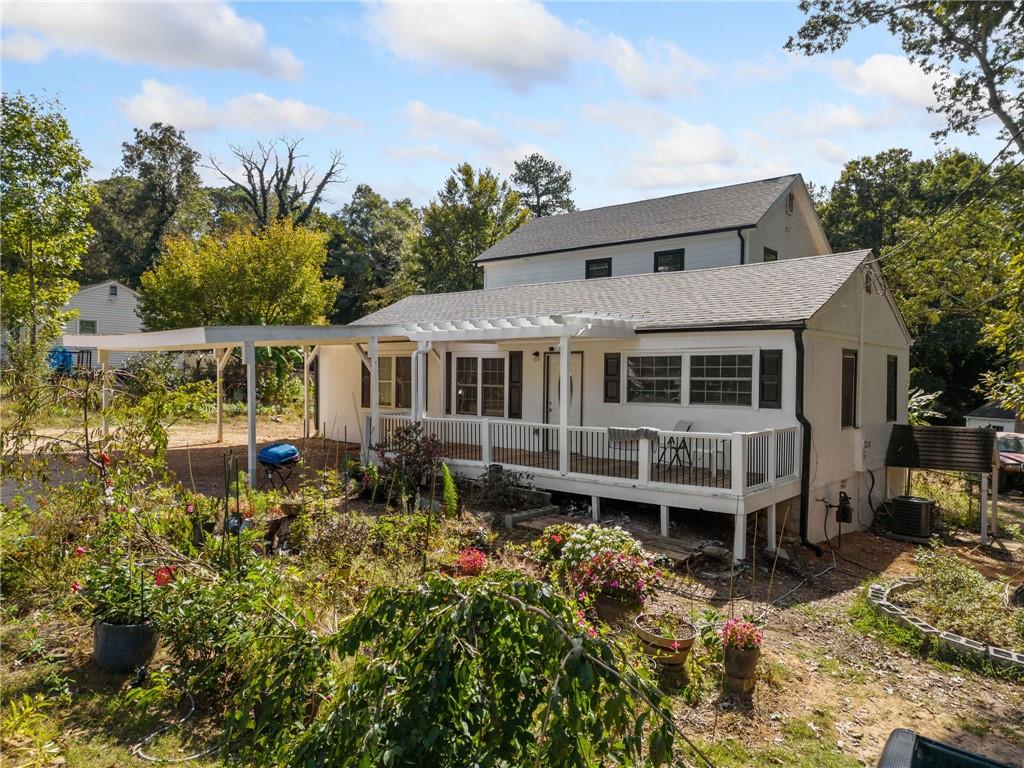 a house with trees in the background