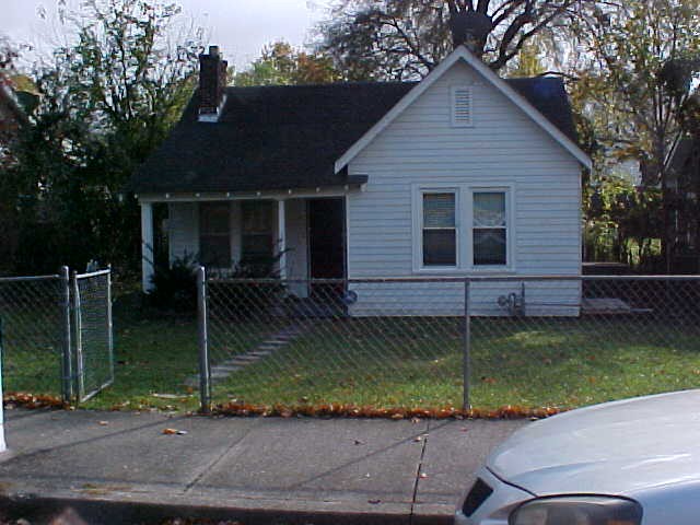 a view of a backyard with a garden