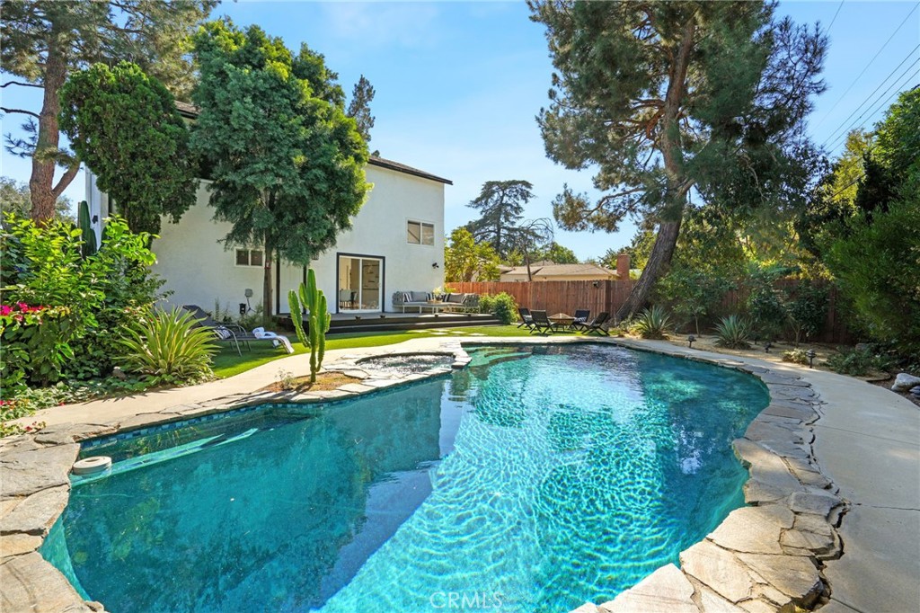 a view of a house with swimming pool