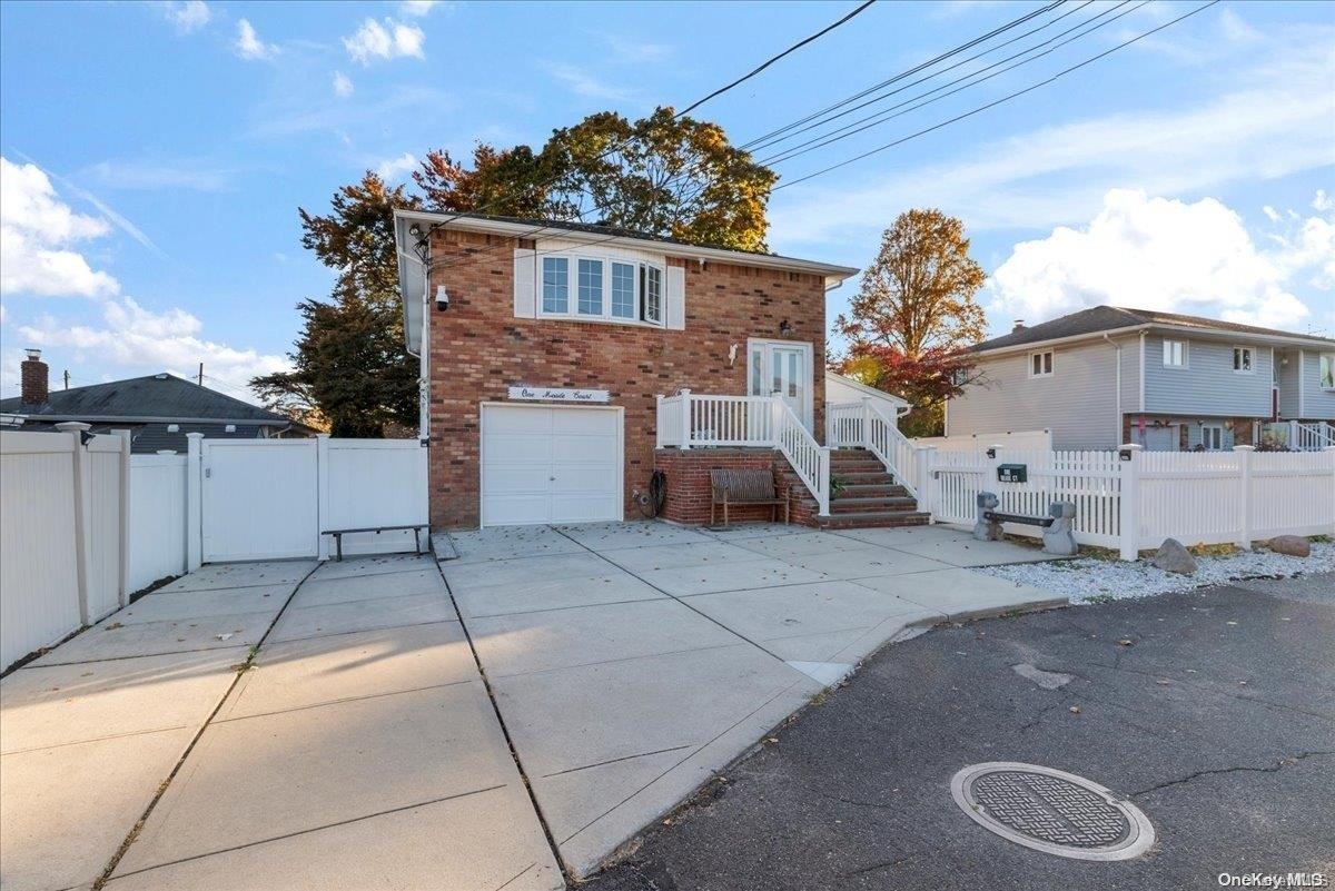 a view of a house with a garage