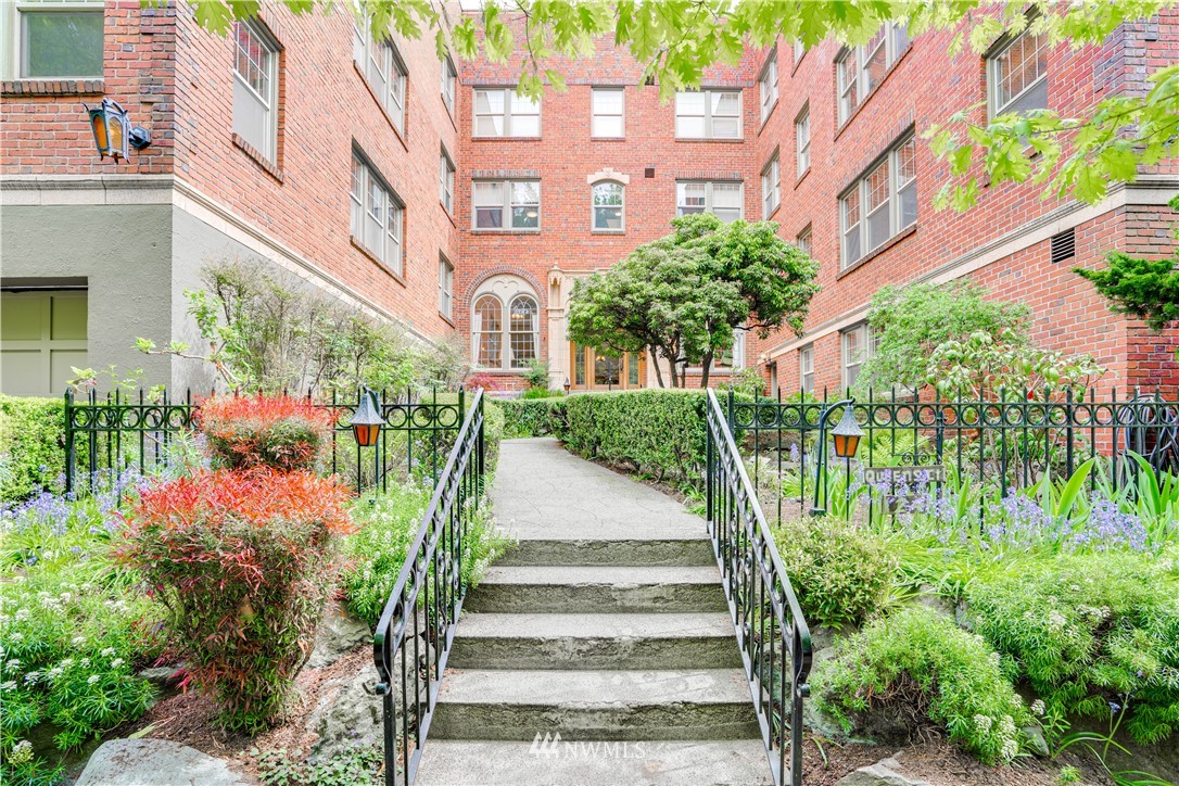 a view of a building with a garden