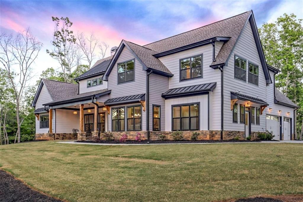 front view of a house with a yard