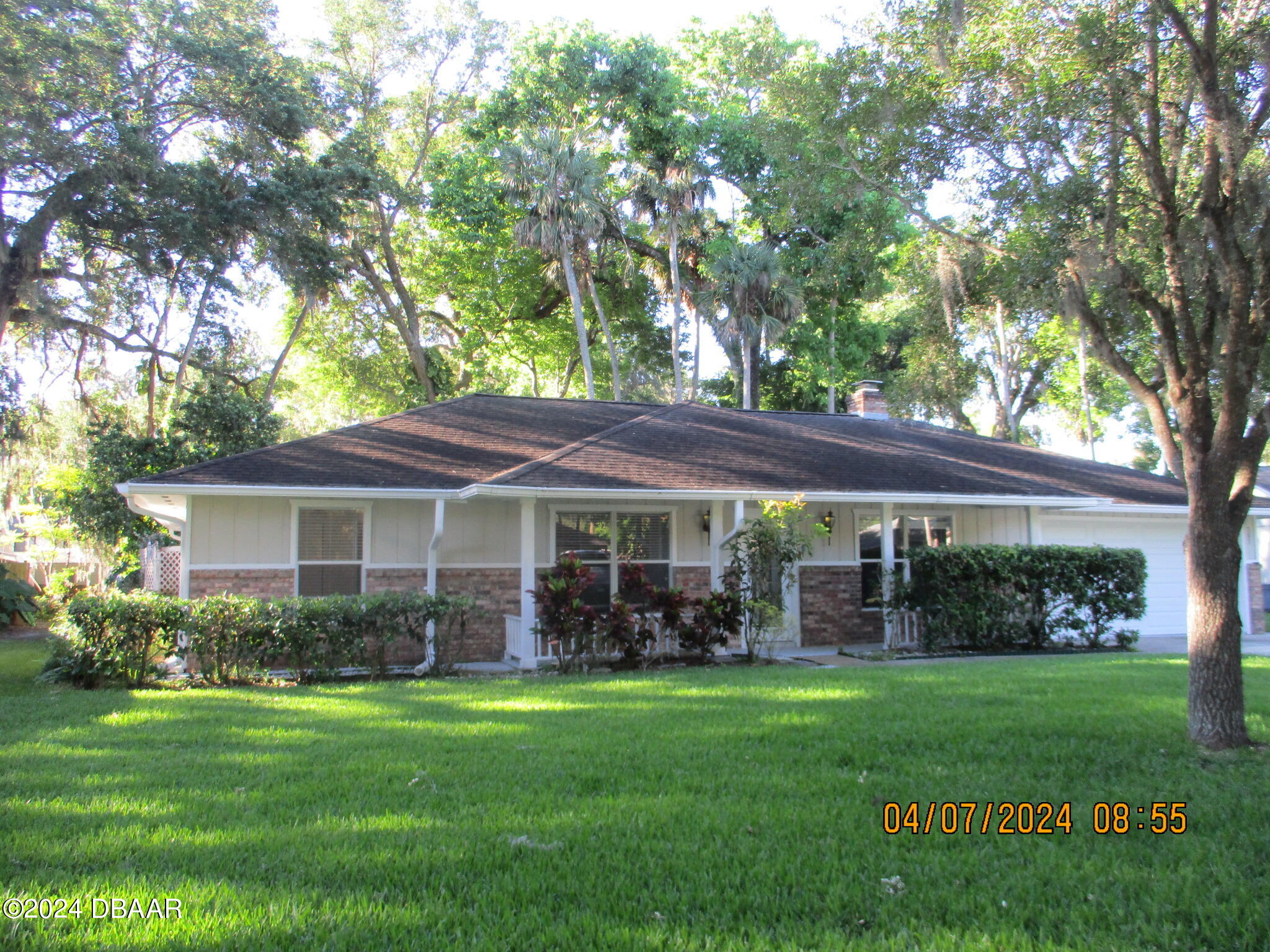 a view of house of a front yard