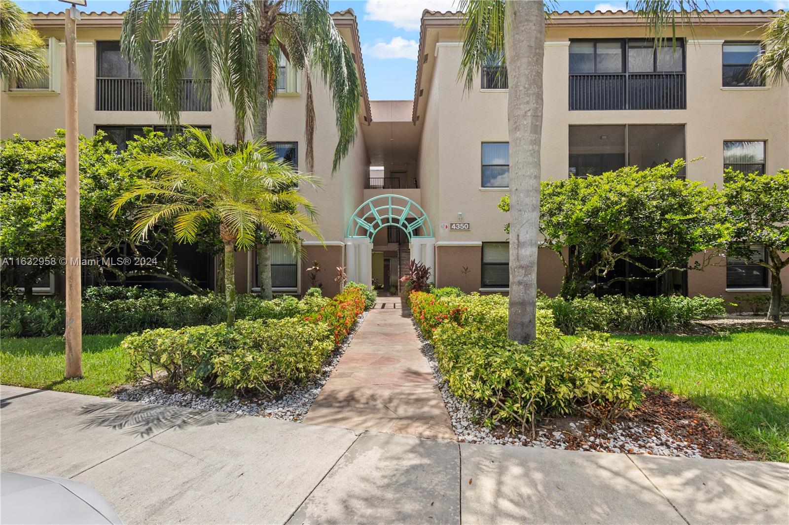 a front view of a multi story residential apartment building