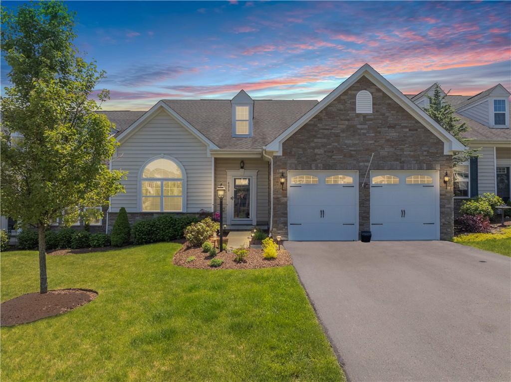 Welcome to 4072 Overview Drive in Overlook at Southpointe! This lovely Carriage Home boasts of engineered hardwood flooring, soaring ceiling in the Great Room, Open Floor Plan and Main Level Master Suite plus a 2 car attached garage.