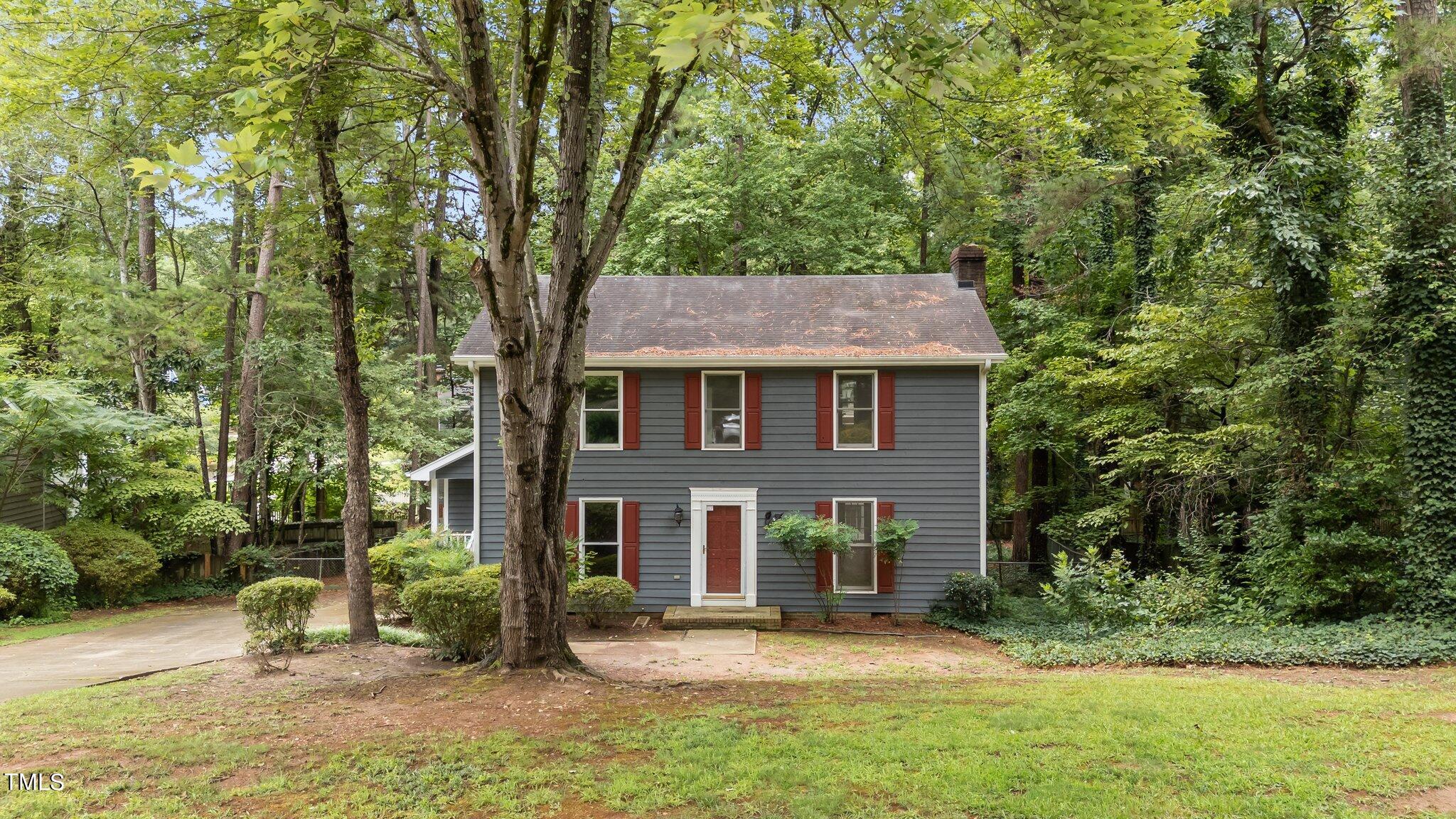 front view of a house with a yard