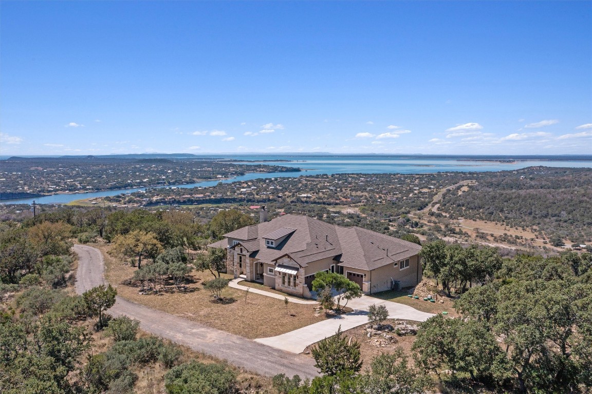 an aerial view of a house with a outdoor space