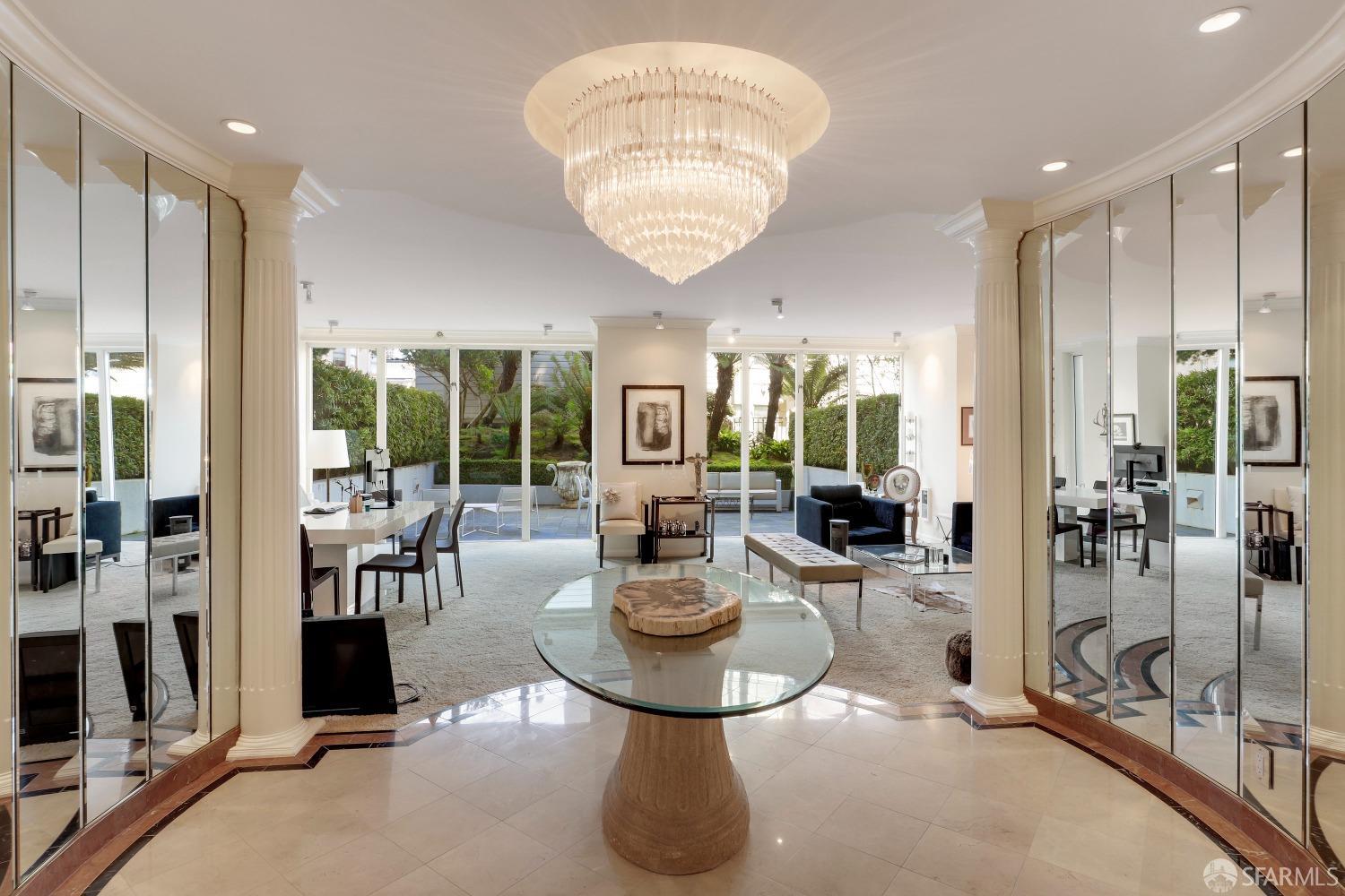 a view of a living room and dining room