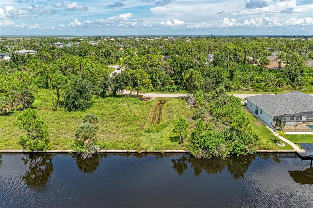 a view of a lake with a yard