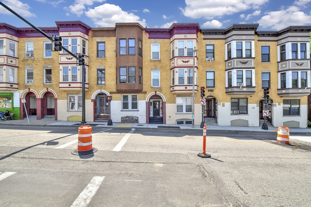 a front view of multi story residential apartment building