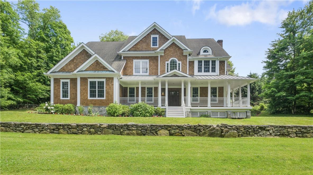 View of front of home and wrap-around porch