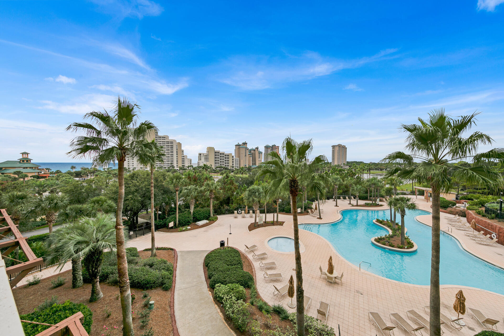 a view of a swimming pool with a patio