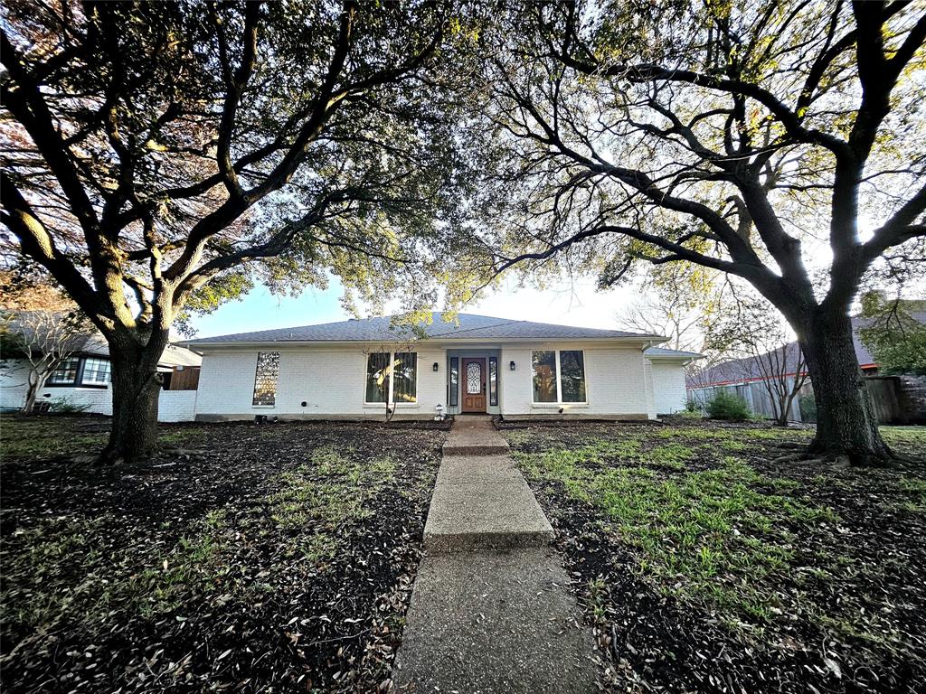 a house with lots of trees