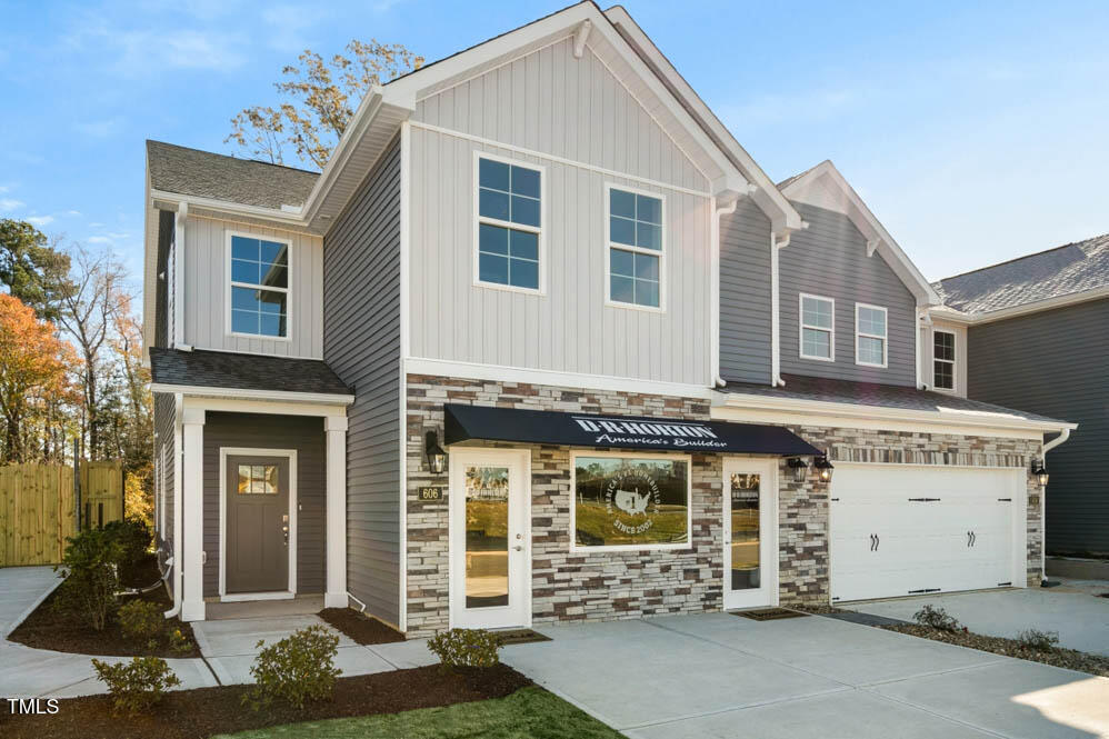 a view of a house with a garage