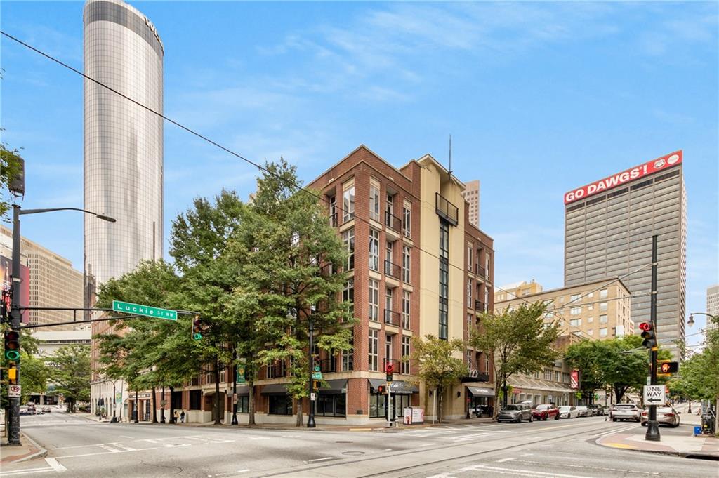 a view of a building and a street