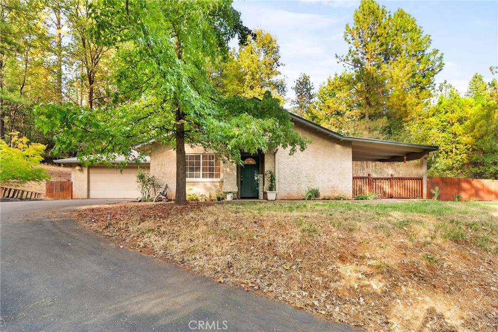 front view of a house with a trees