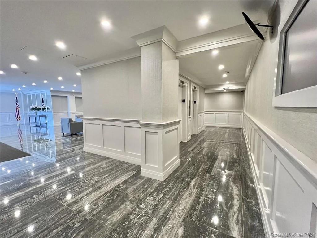 a view of entryway with wooden floor