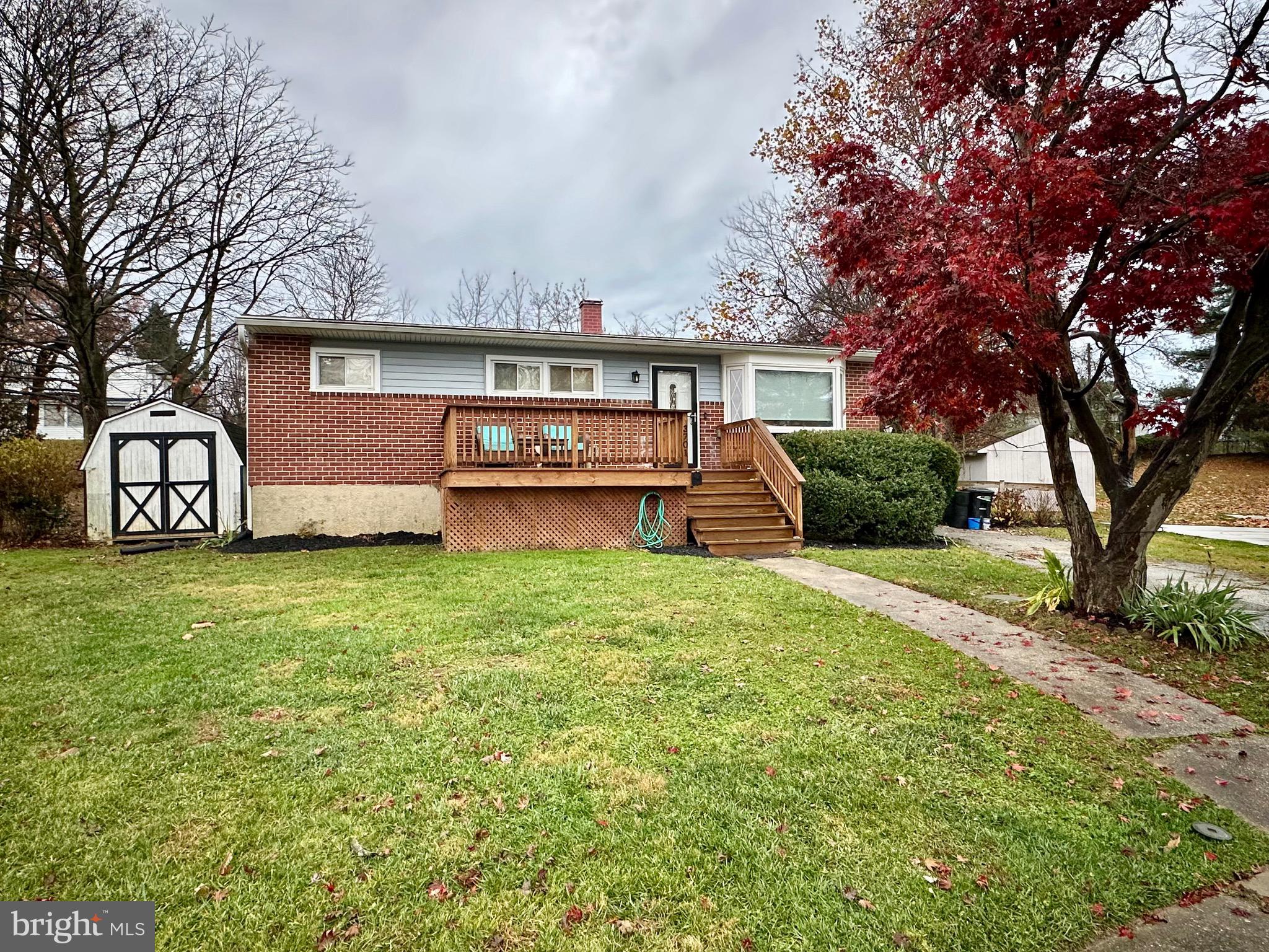 front view of a house with a big yard