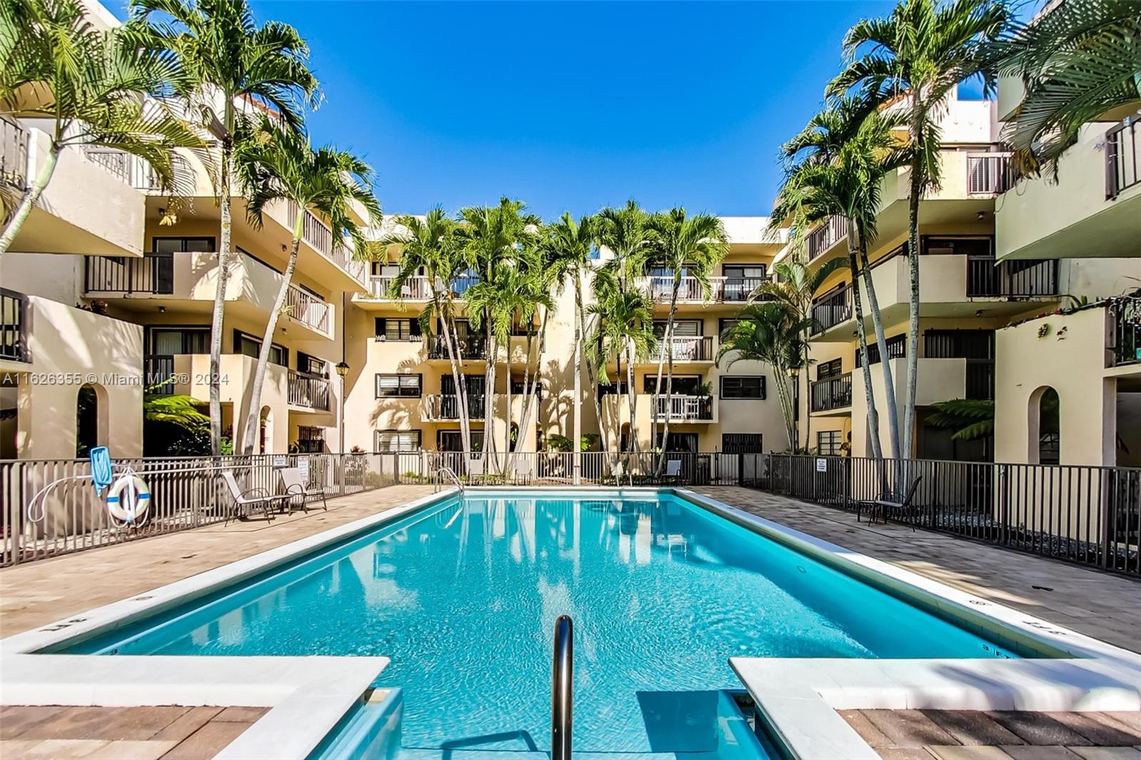 a view of a swimming pool with a patio