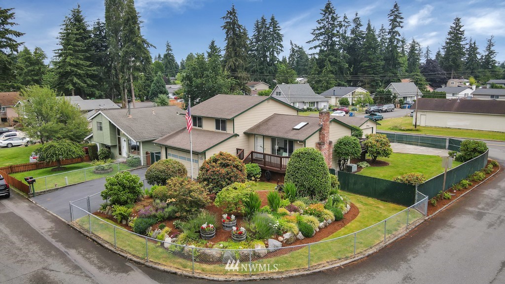 an aerial view of a house with garden