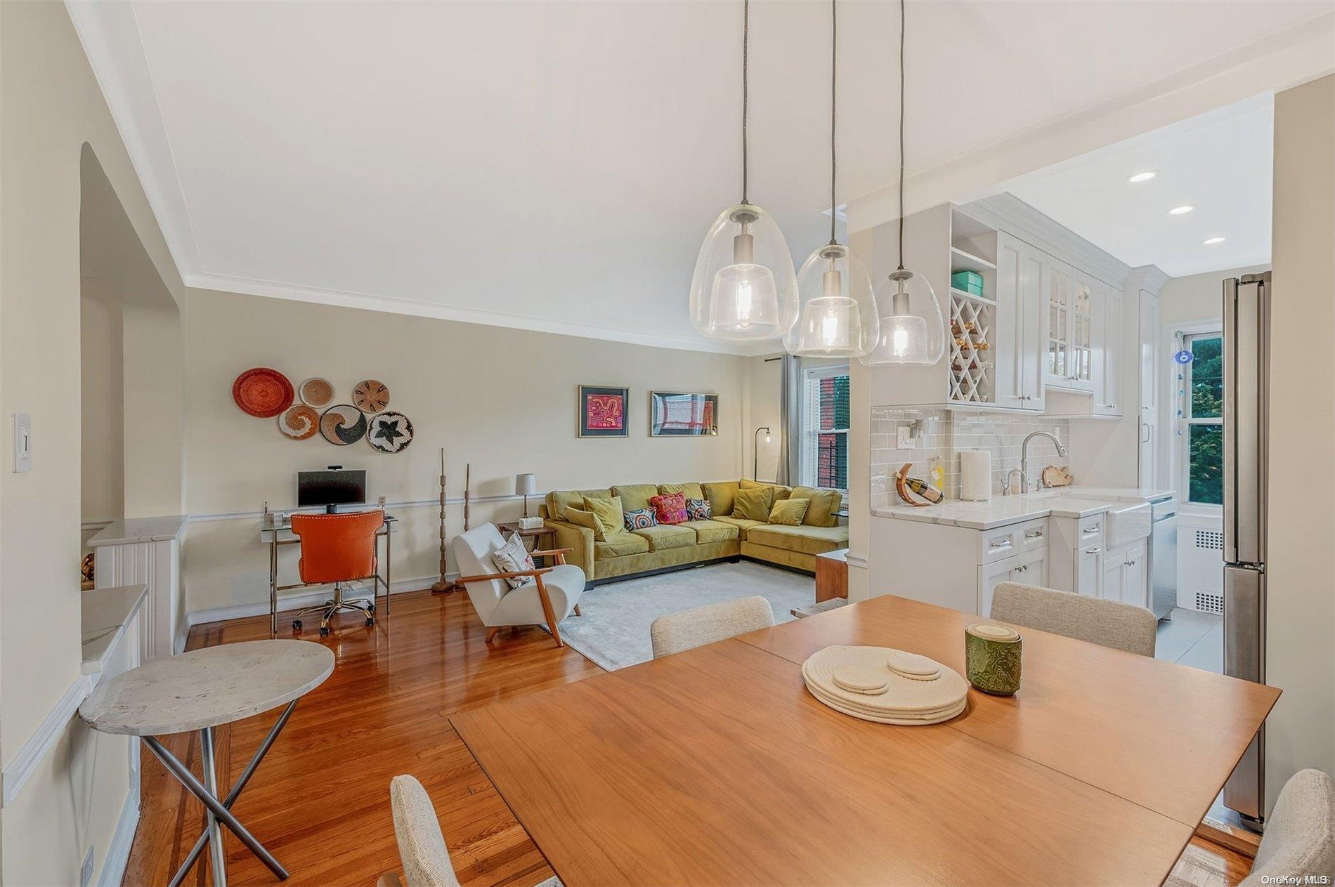 a kitchen with a table and chairs in it