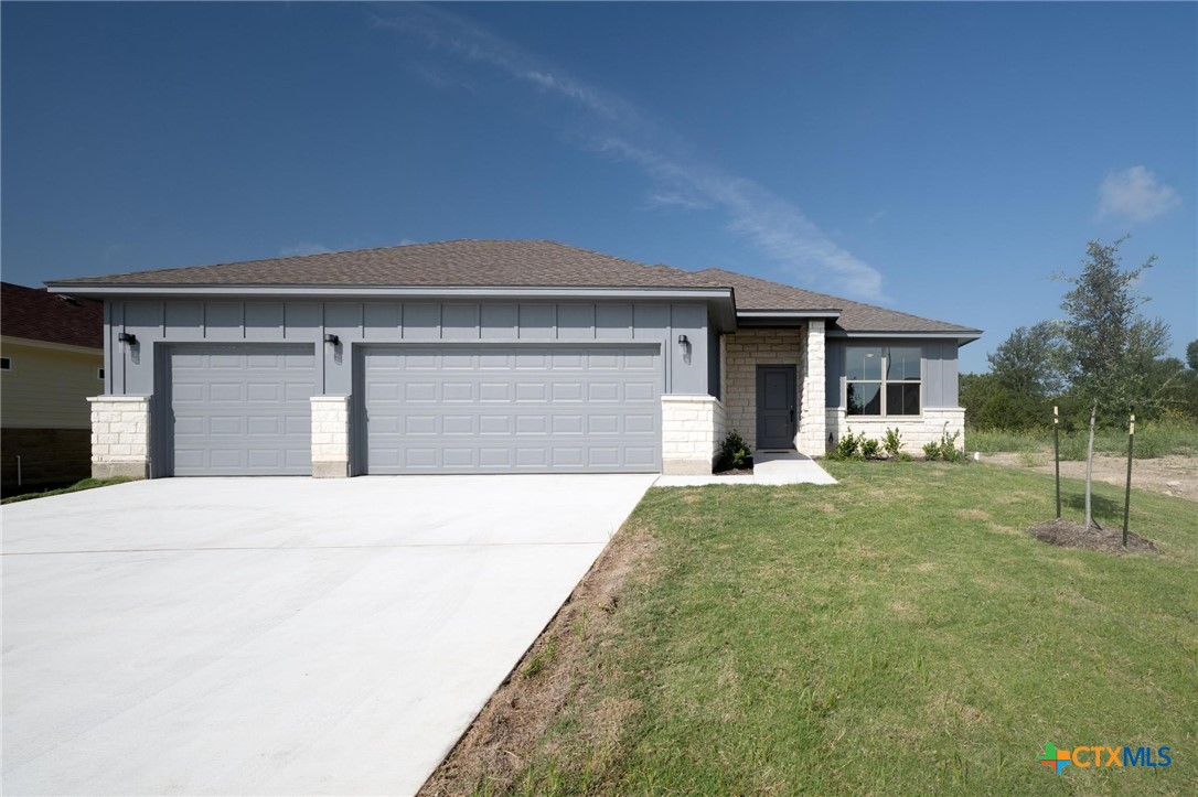 a front view of house with yard