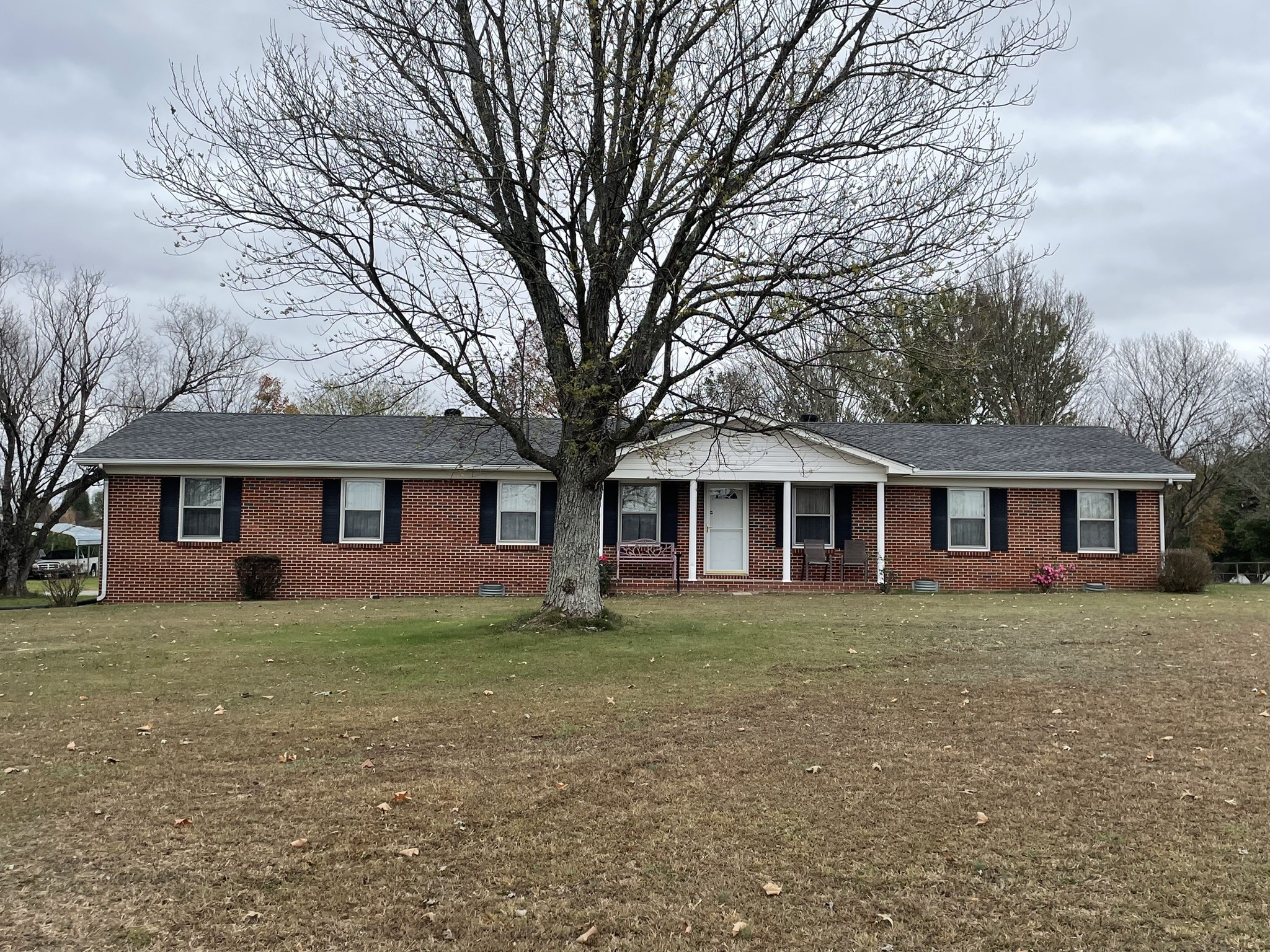 front view of a house with a yard