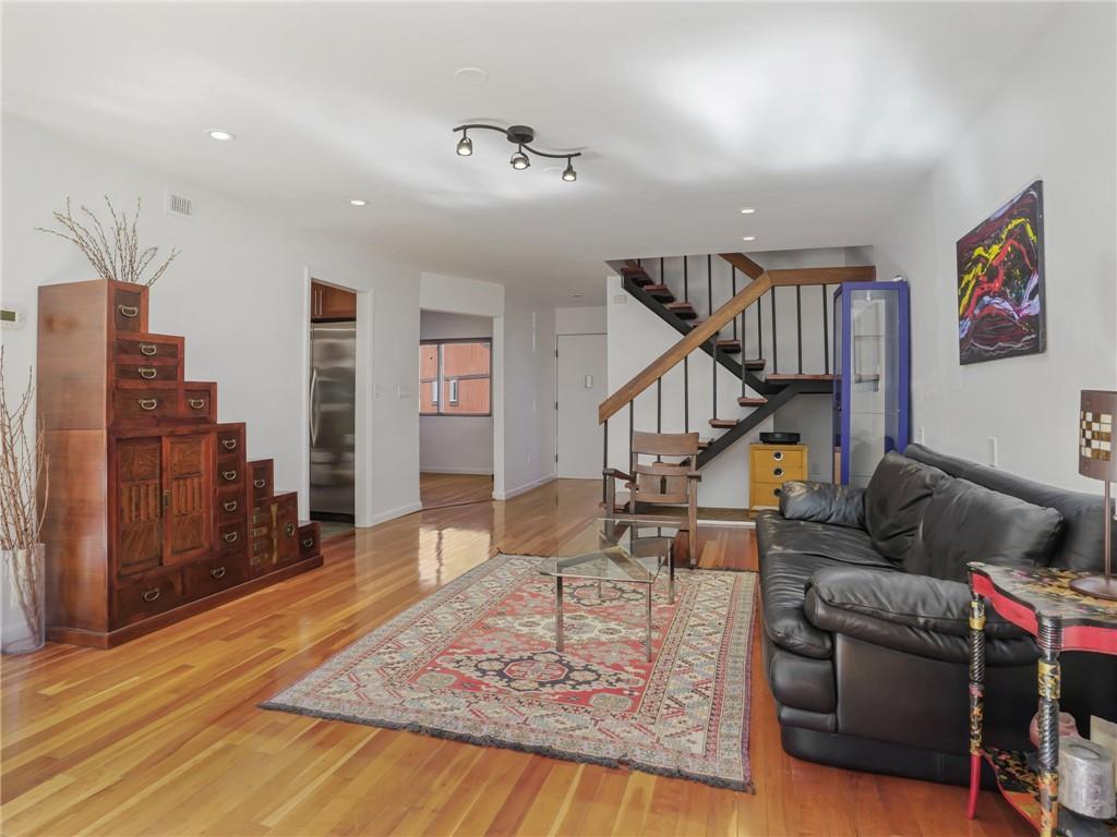 Living room featuring cherrywood flooring