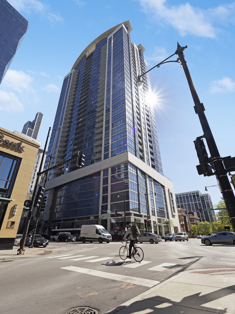 a tall building sitting on the side of a street