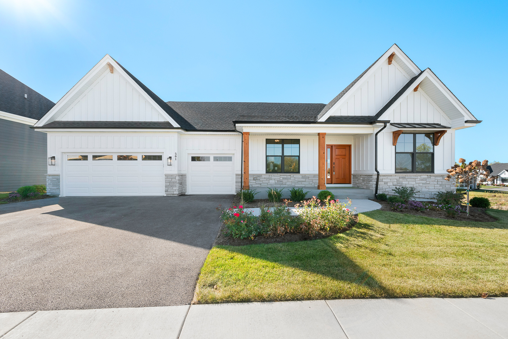 a front view of a house with garden