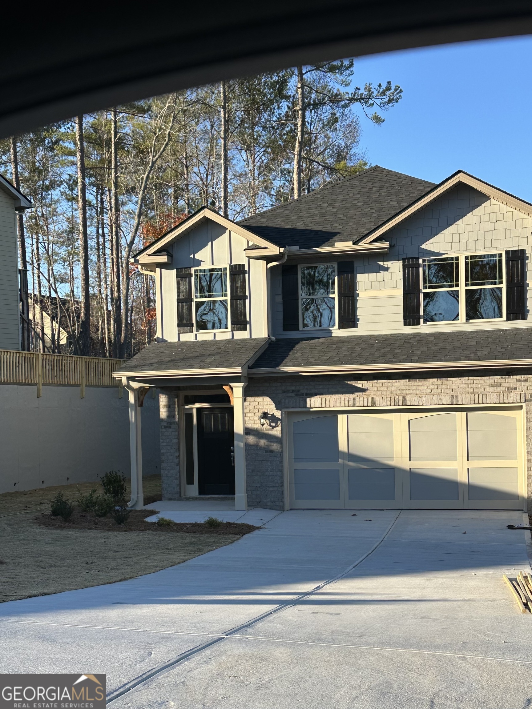 a front view of a house with a porch