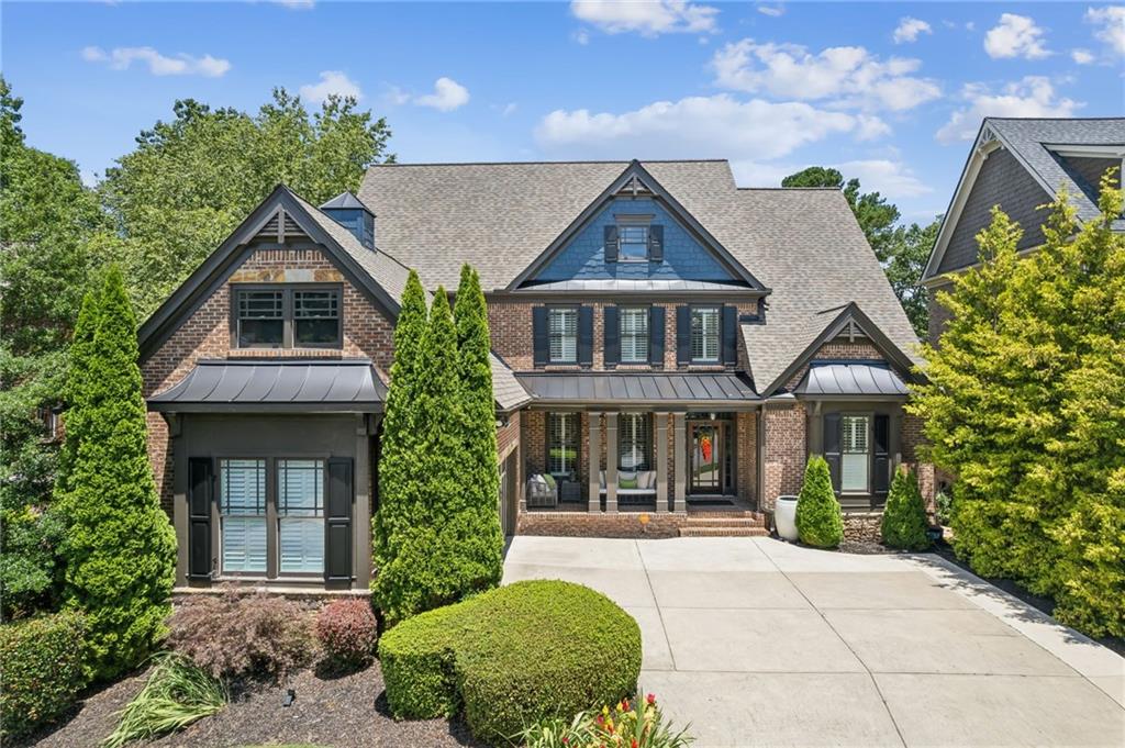 front view of a house with a yard