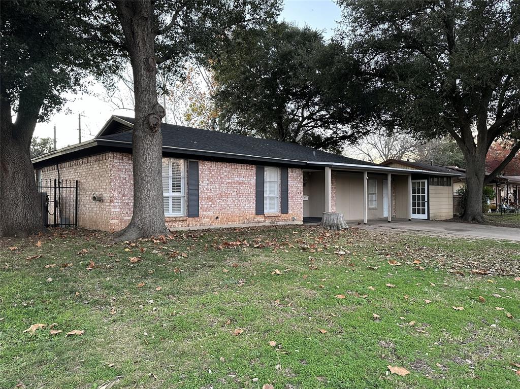 front view of a house with a dry yard