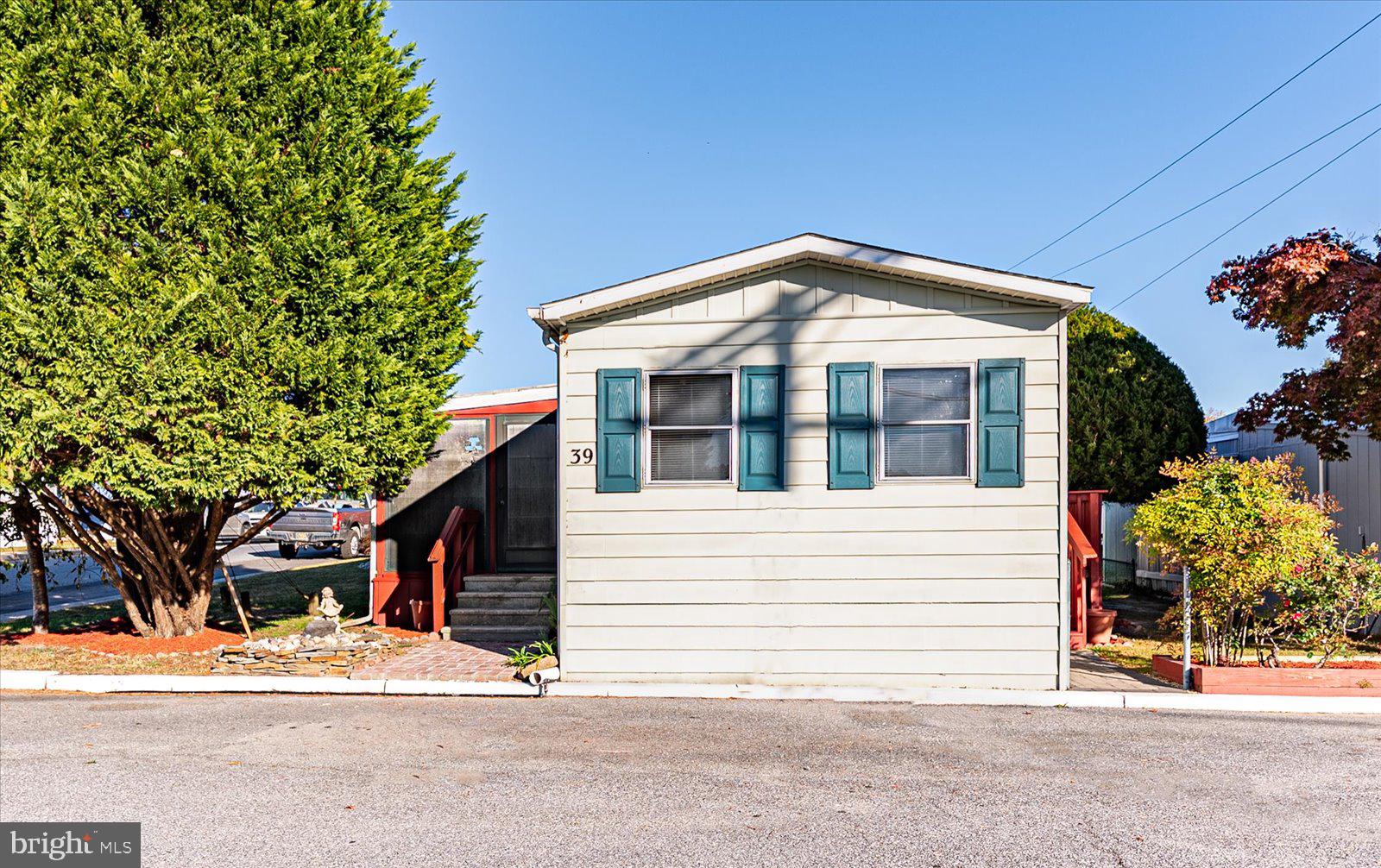 a front view of a house with a garage