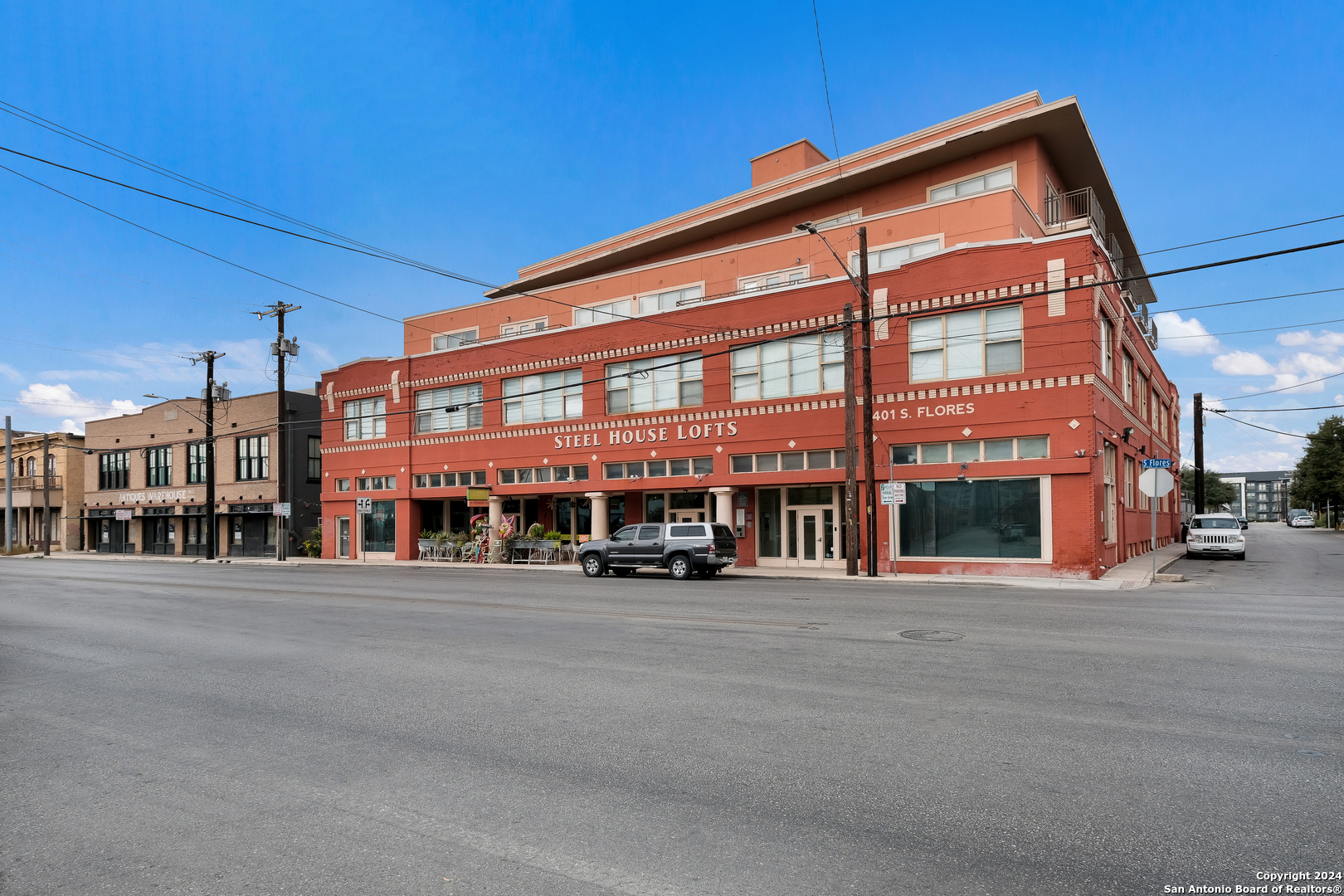 a front view of a building with a street