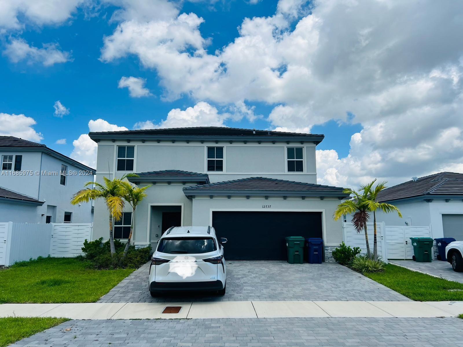 a front view of house with yard