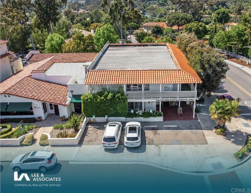 an aerial view of a house with swimming pool