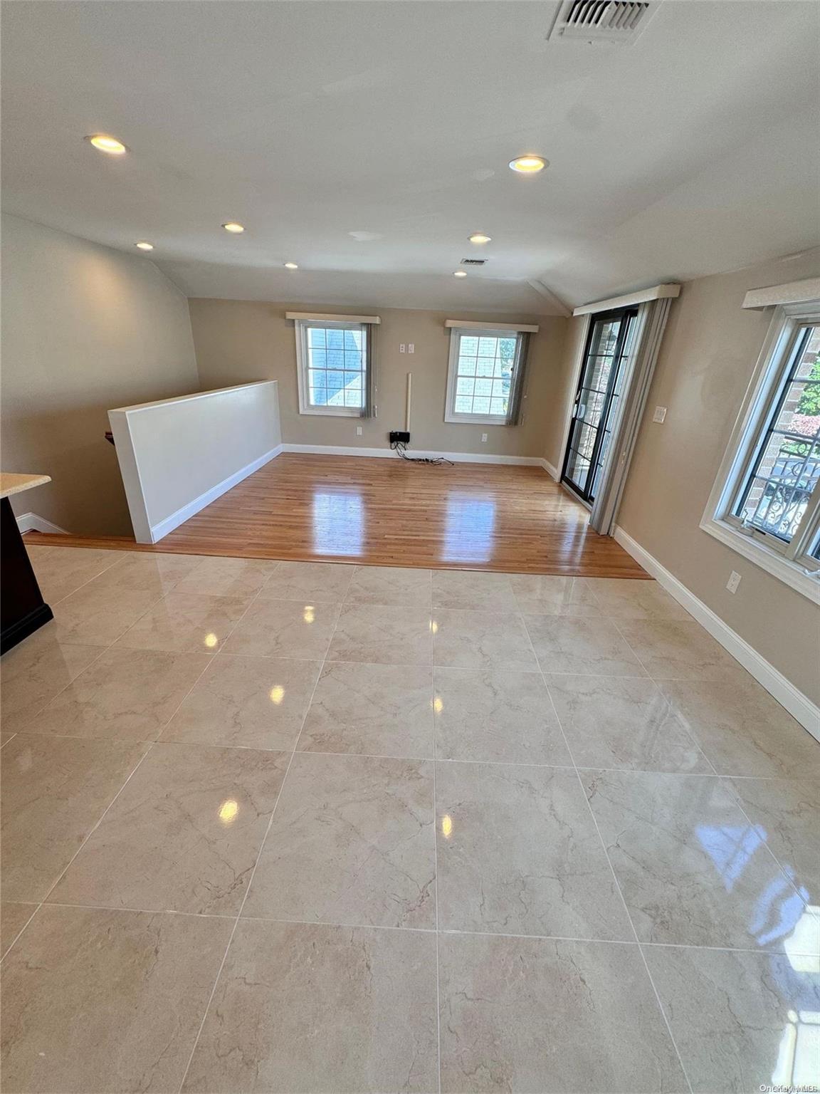 a view of a room with furniture and a livingroom