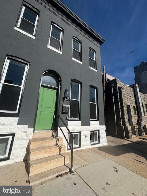 a view of front of house with a street