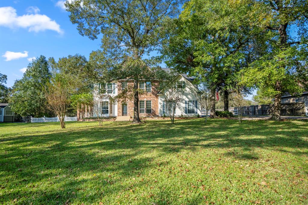 This charming home is located on 1.14 acres, offering a perfect blend of rustic elegance and modern comforts