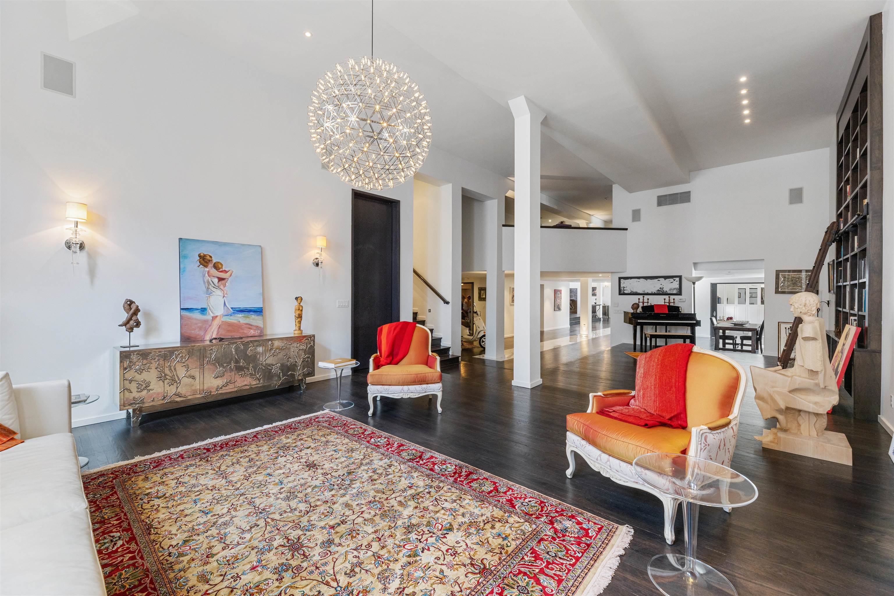 a living room with furniture and rug