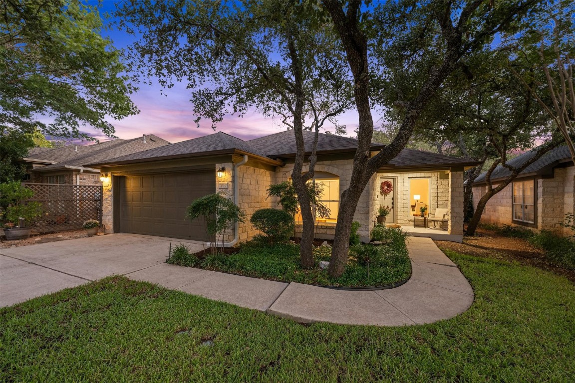 front view of a house with a yard