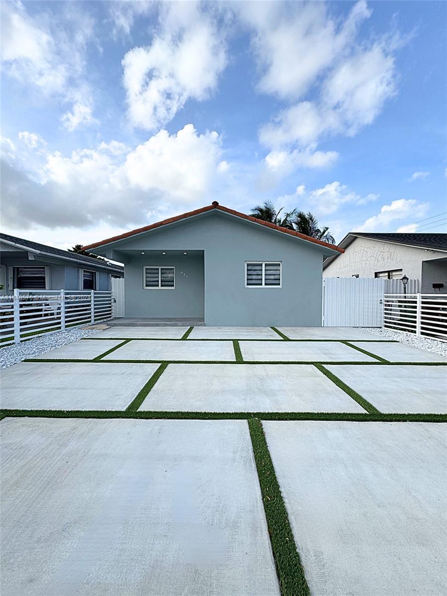 a house view with a outdoor space