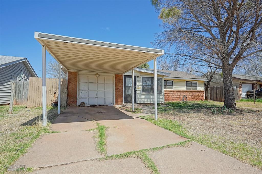 a view of backyard of house