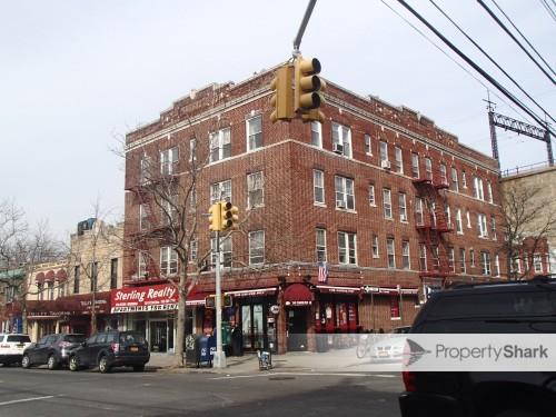 a view of a building with a street