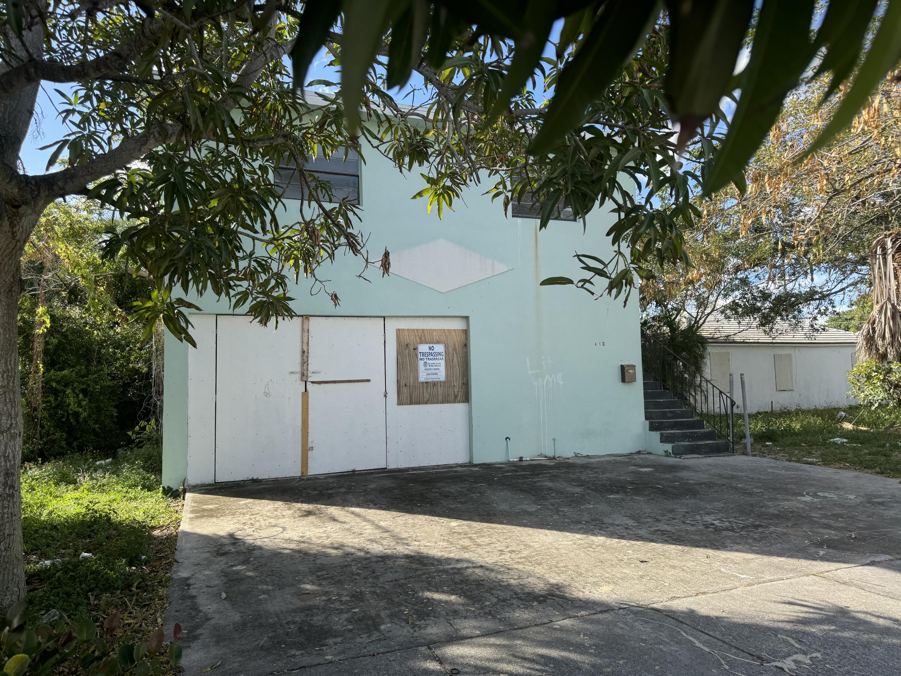 a house with trees in front of it