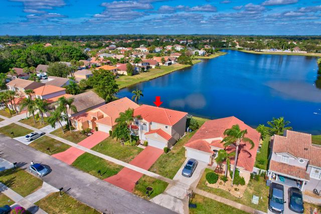 $795,000 | 9461 Aegean Drive | Boca Gardens